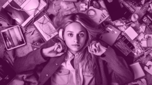 a women lying down in the center between a lot of different technical gadgets - a metaphor for difficulty choosing the right ERP for your business